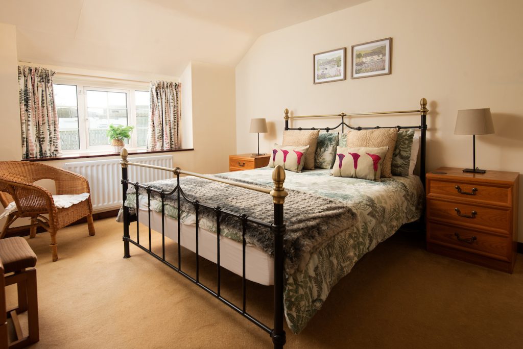 King-size bed at Dunstanburgh View Holiday Cottage