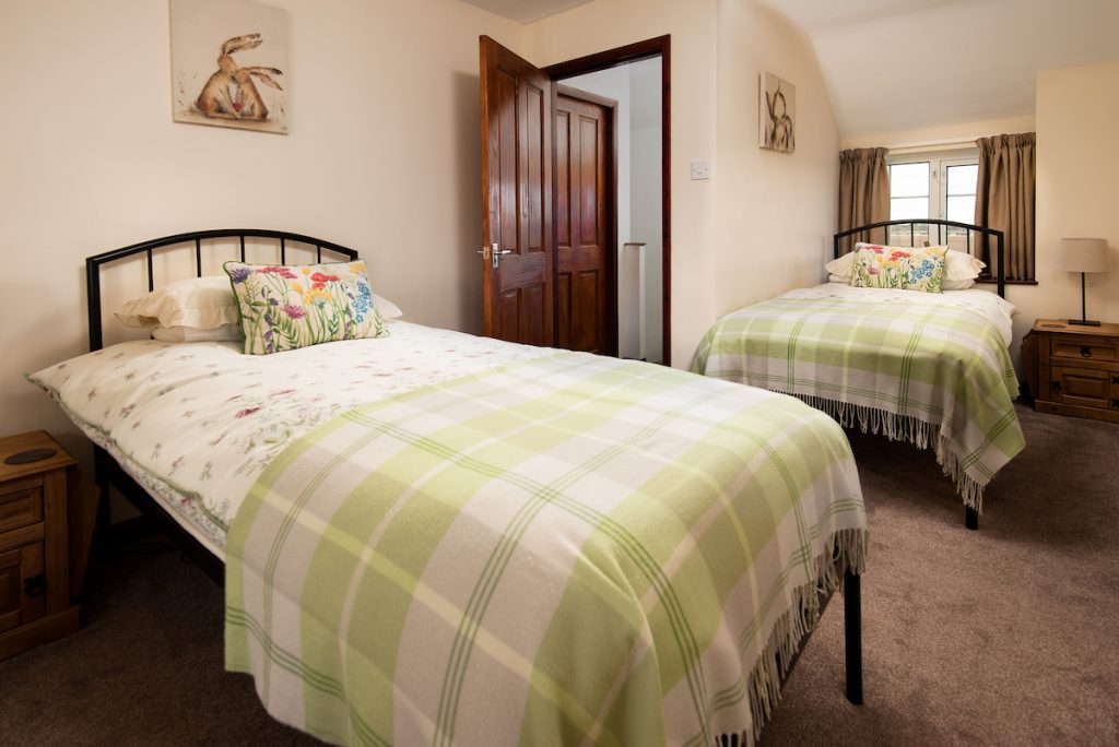 Twin Bedroom at Dunstanburgh View Holiday Cottage