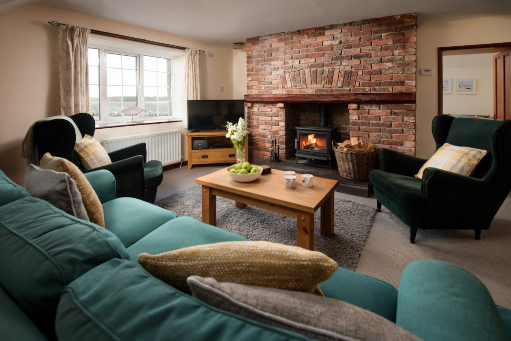 Sitting room at Dunstanburgh View Holiday Cottage